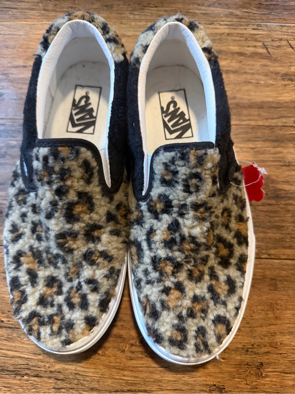 Vans women’s Leopard Faux-Fur Slip-On Sneakers in Black, Tan & Cream